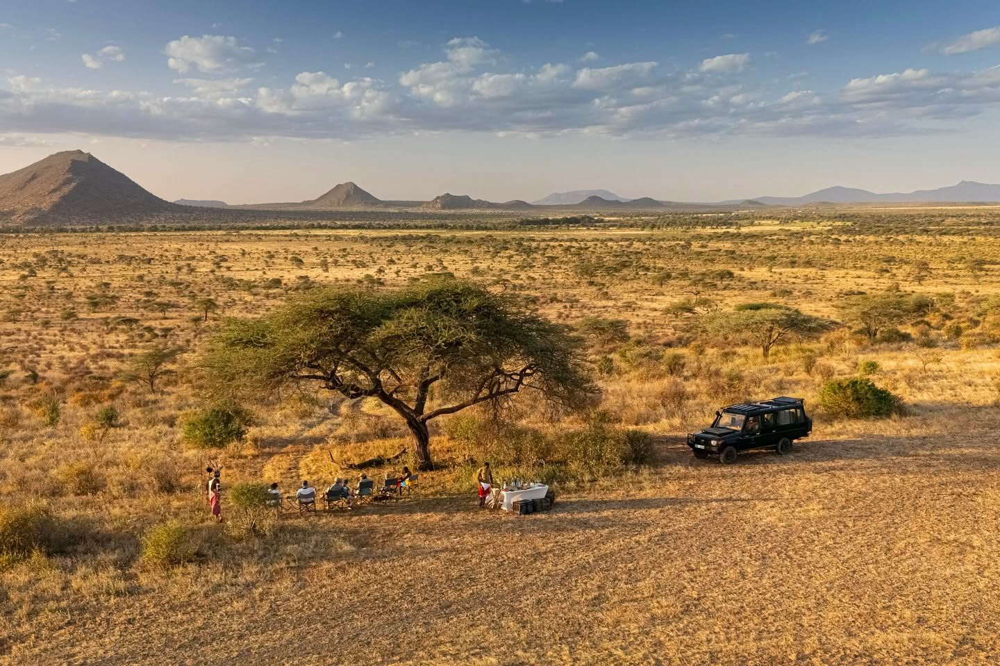 A private bush breakfast set under an acacia on the northern plains